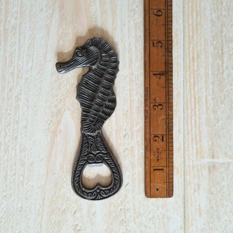 Seahorse hand held bottle opener in cast iron - shorter handle