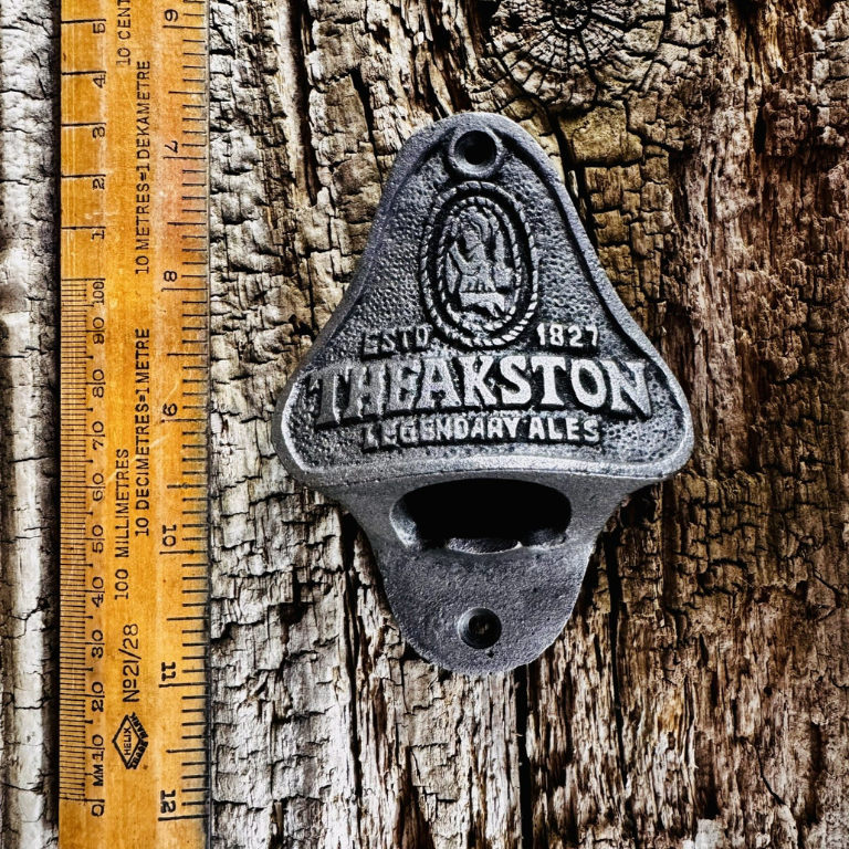 Bottle Opener Wall Mounted THEAKSTONS Cast Antique Iron