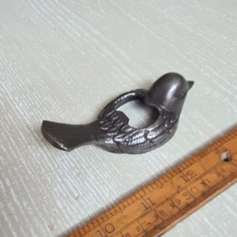 Bird shaped finch hand held bottle opener cast iron