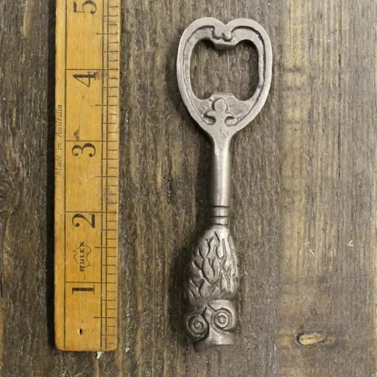 Hand held owl bottle opener