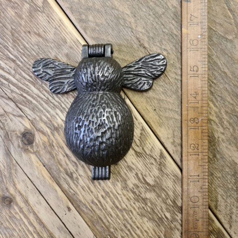 Introduce a charming and nature-inspired touch to your home with the Bee Design Door Knocker, which features a detailed bee motif