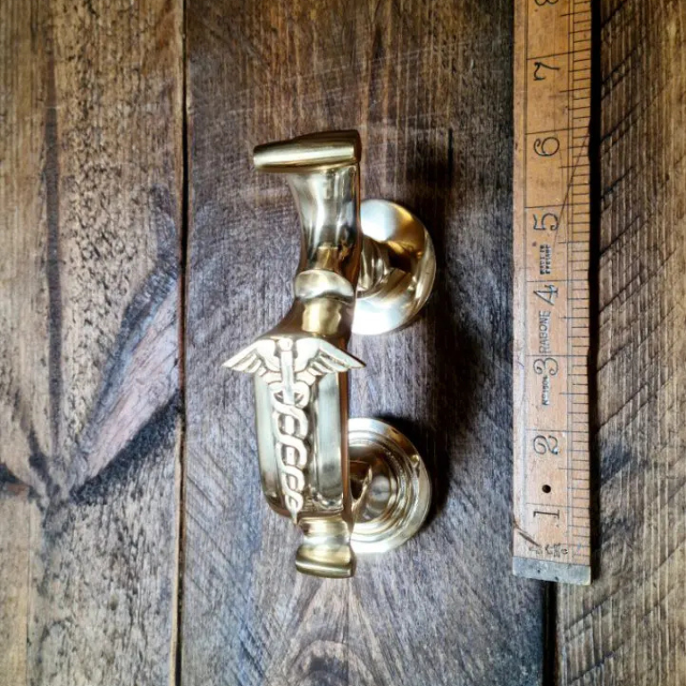 Door knocker with traditional doctor's emblem on in solid brass 6 inches